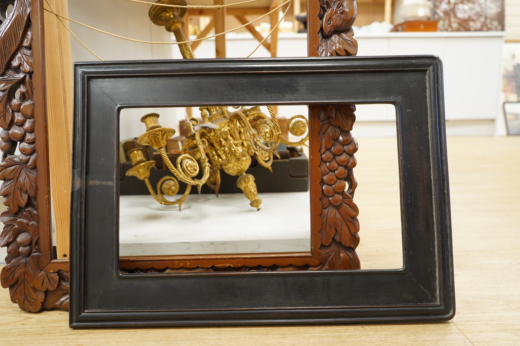 Two picture frames to include a carved wood example, aperture size 74 x 41cm